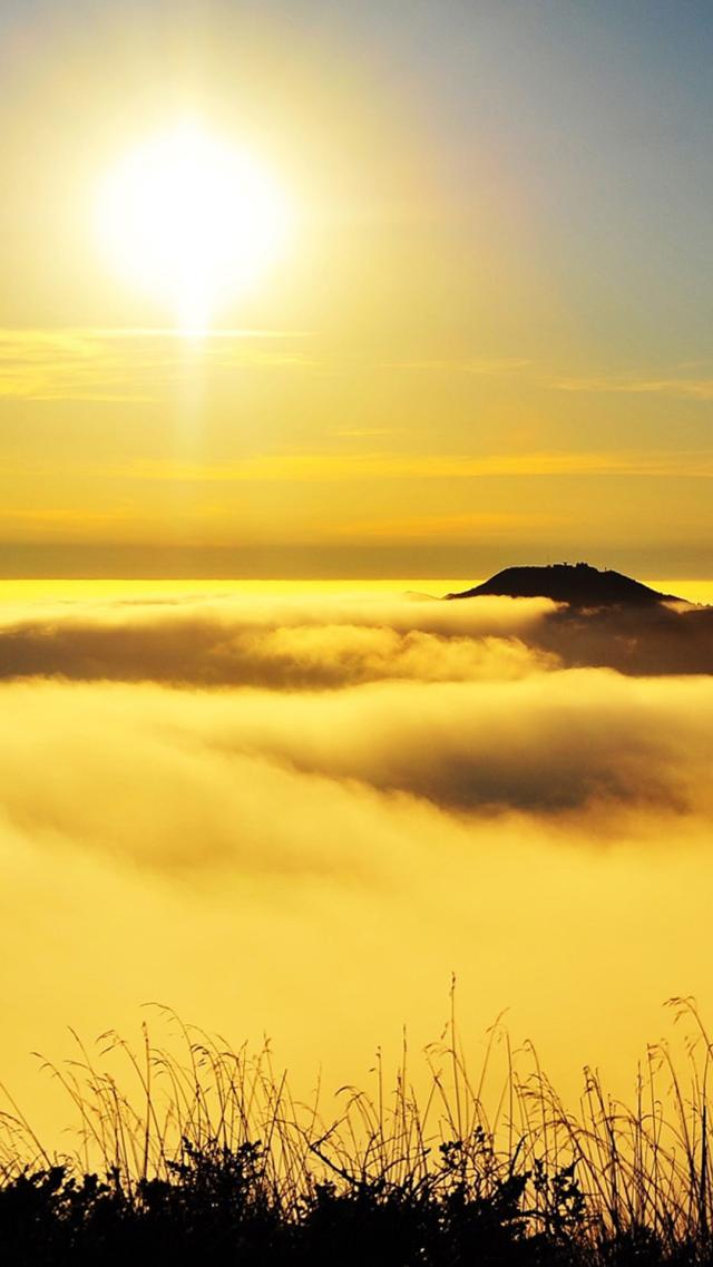 Sea of Clouds Shimmering with Golden Light