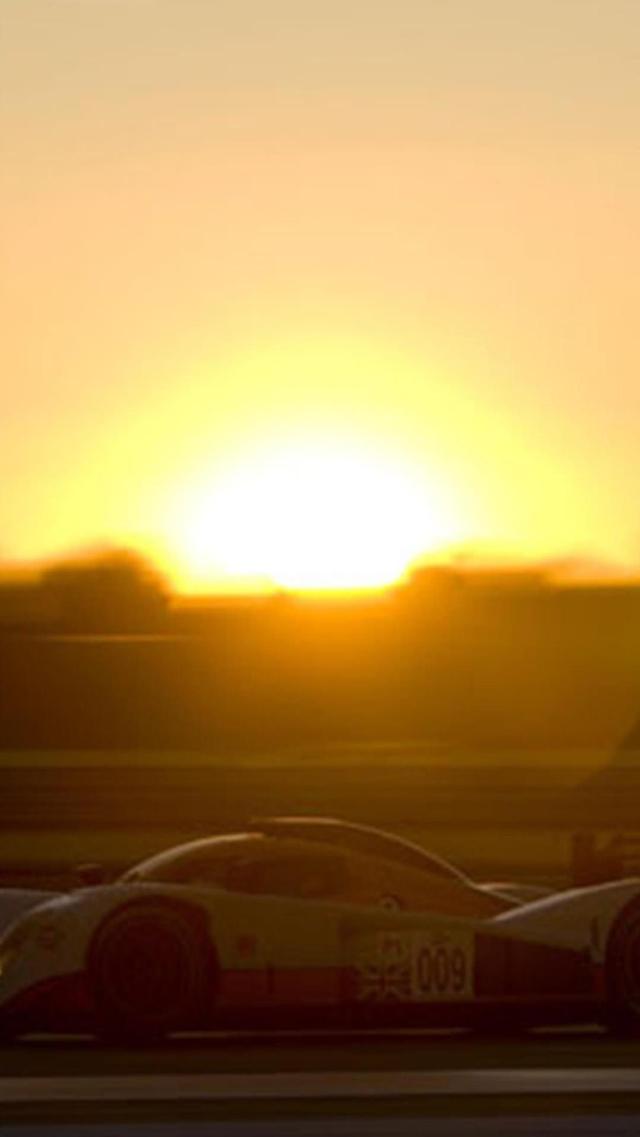 Sports Wallpaper of Cars and Sunset Glow
