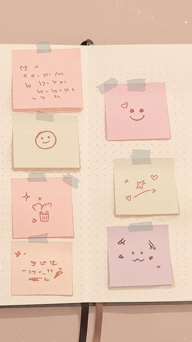 Sticky Note Doodles on a Notebook