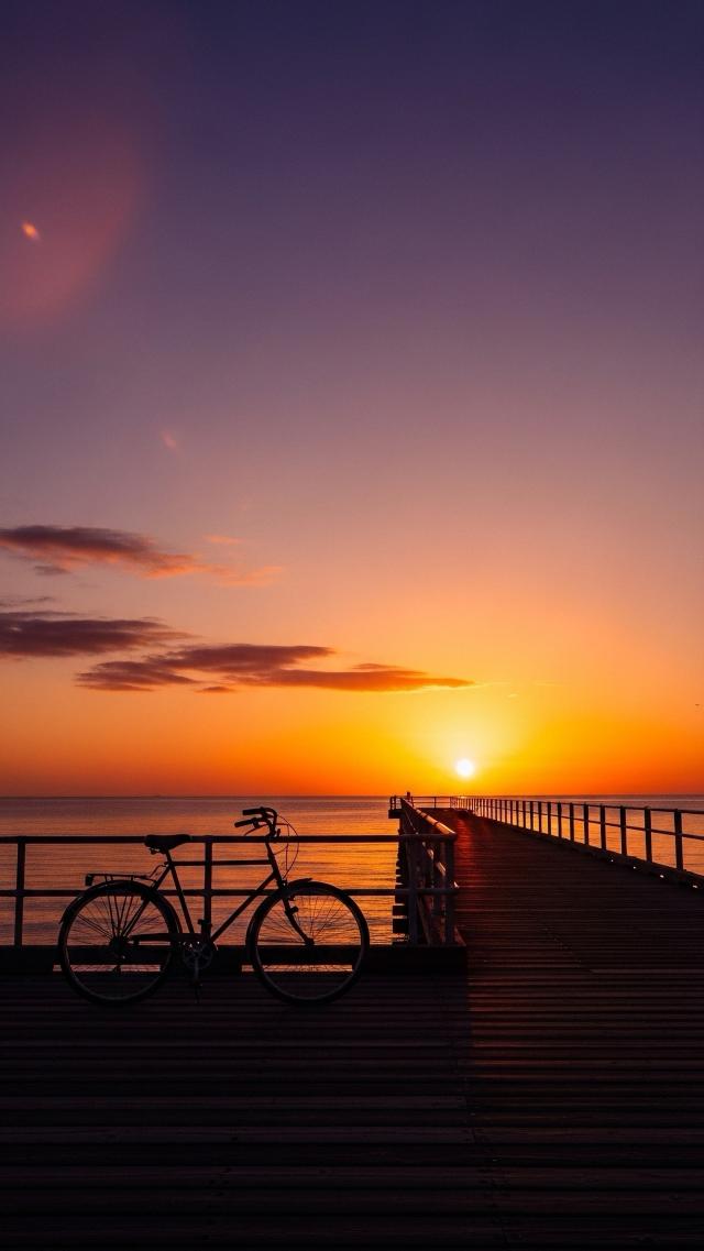 Sunset Breakwater and Bicycle