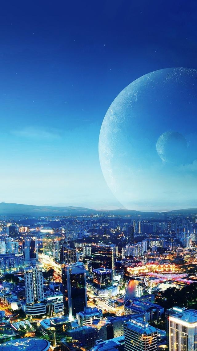 夜景の遠くに巨大な惑星