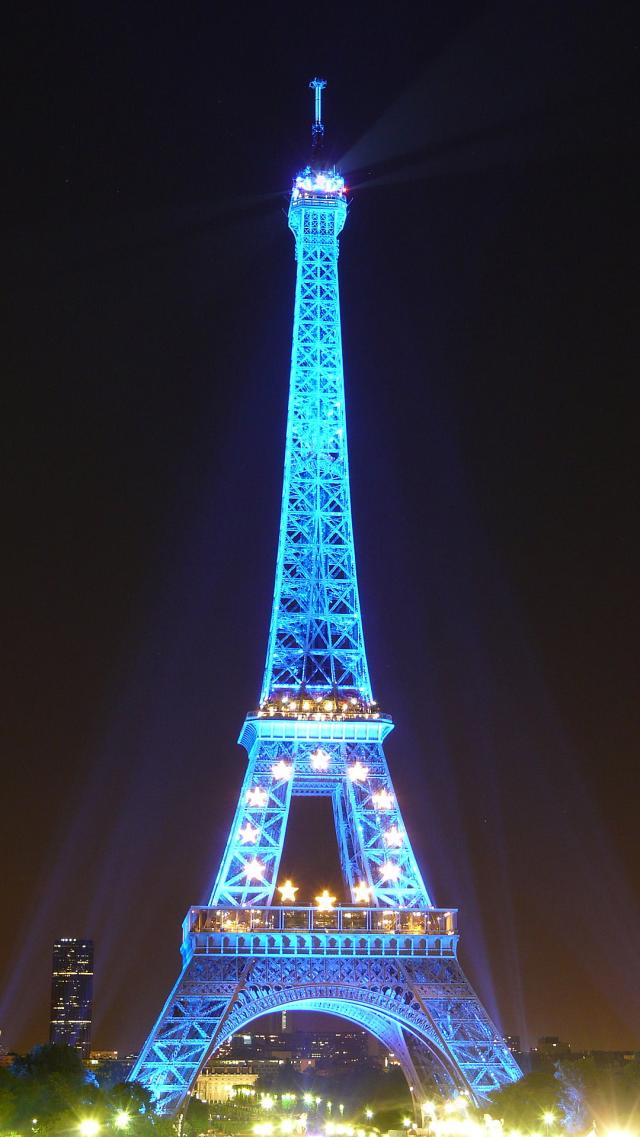 The Eiffel Tower Illuminated by Blue Lights