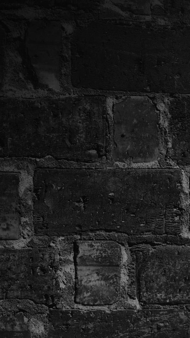 Cool Apple XS Wallpaper on Brick Wall