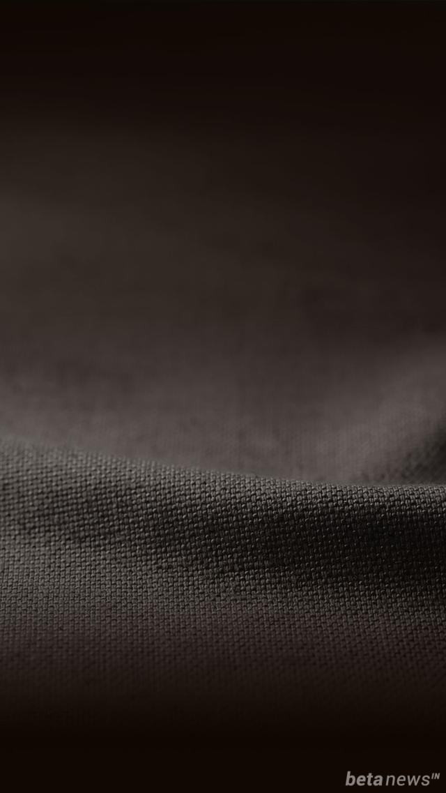 黒い布地のスマホ壁紙